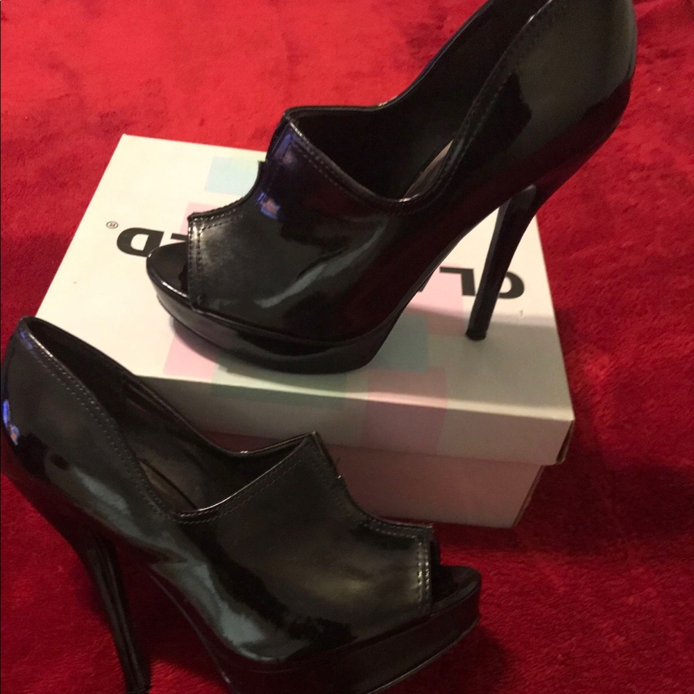 Black patent leather stilettos
